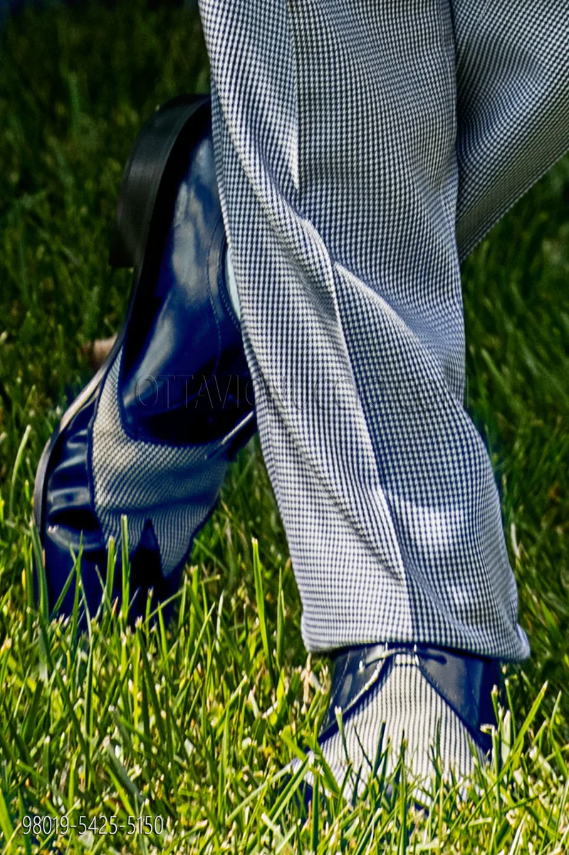 Blue patent leather and houndstooth two-coloured shoes