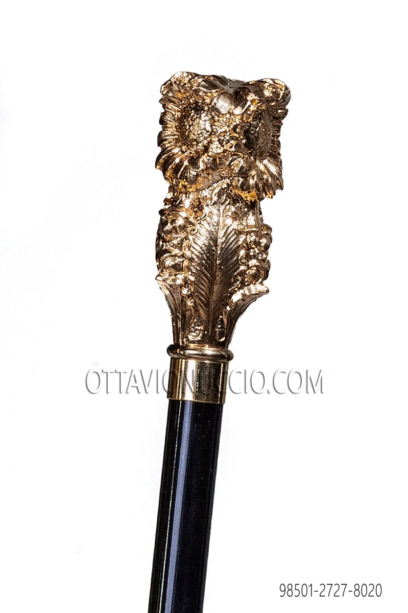 Schwarzer Stock mit golden Griff
