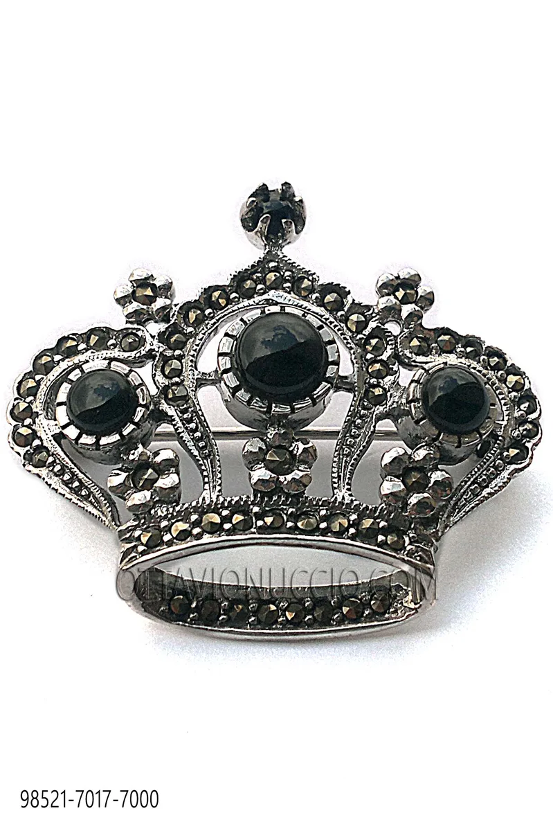 Broche en forme de couronne plaquée argent