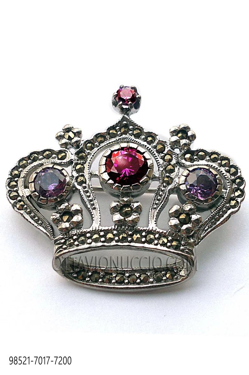 Broche en forme de couronne plaquée argent