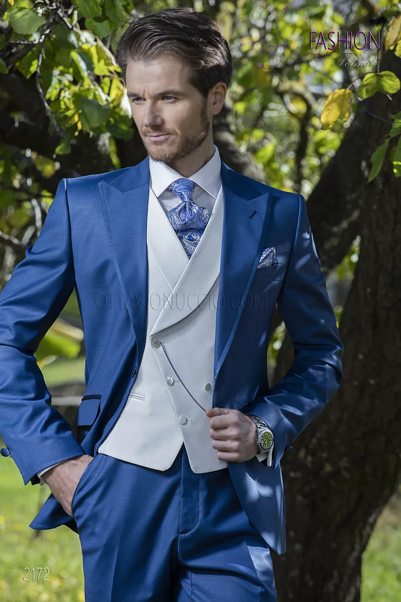 Bespoke italian wedding suit in blue wool blend with white vest 1