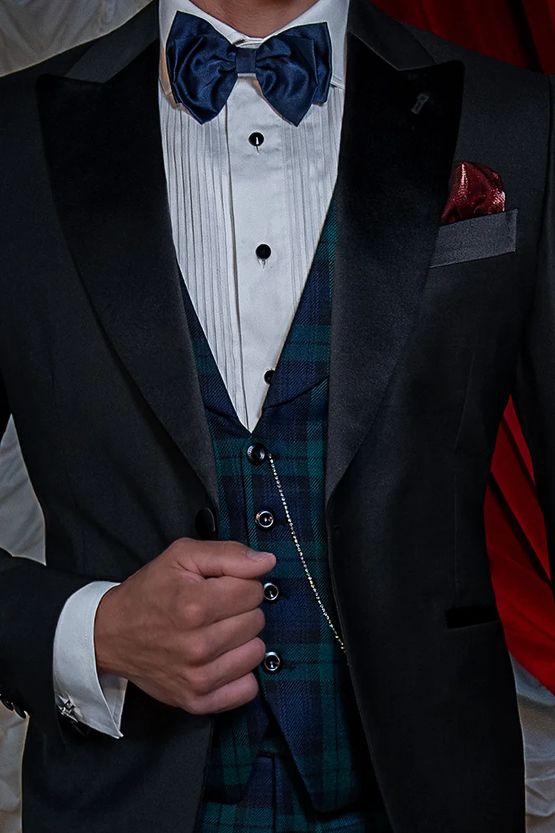 Gilet in tartan verde con collo sciallato